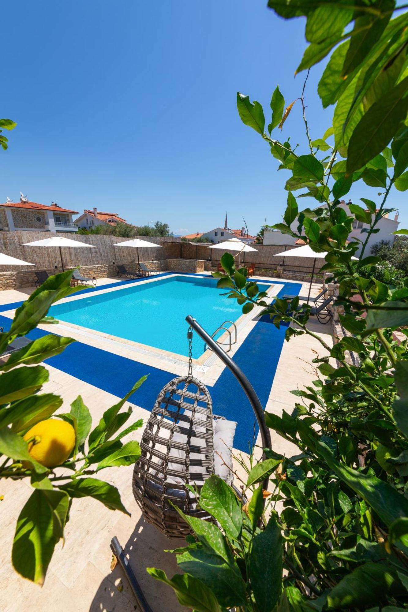 Oezguem Suite Otel ดัตชา ภายนอก รูปภาพ